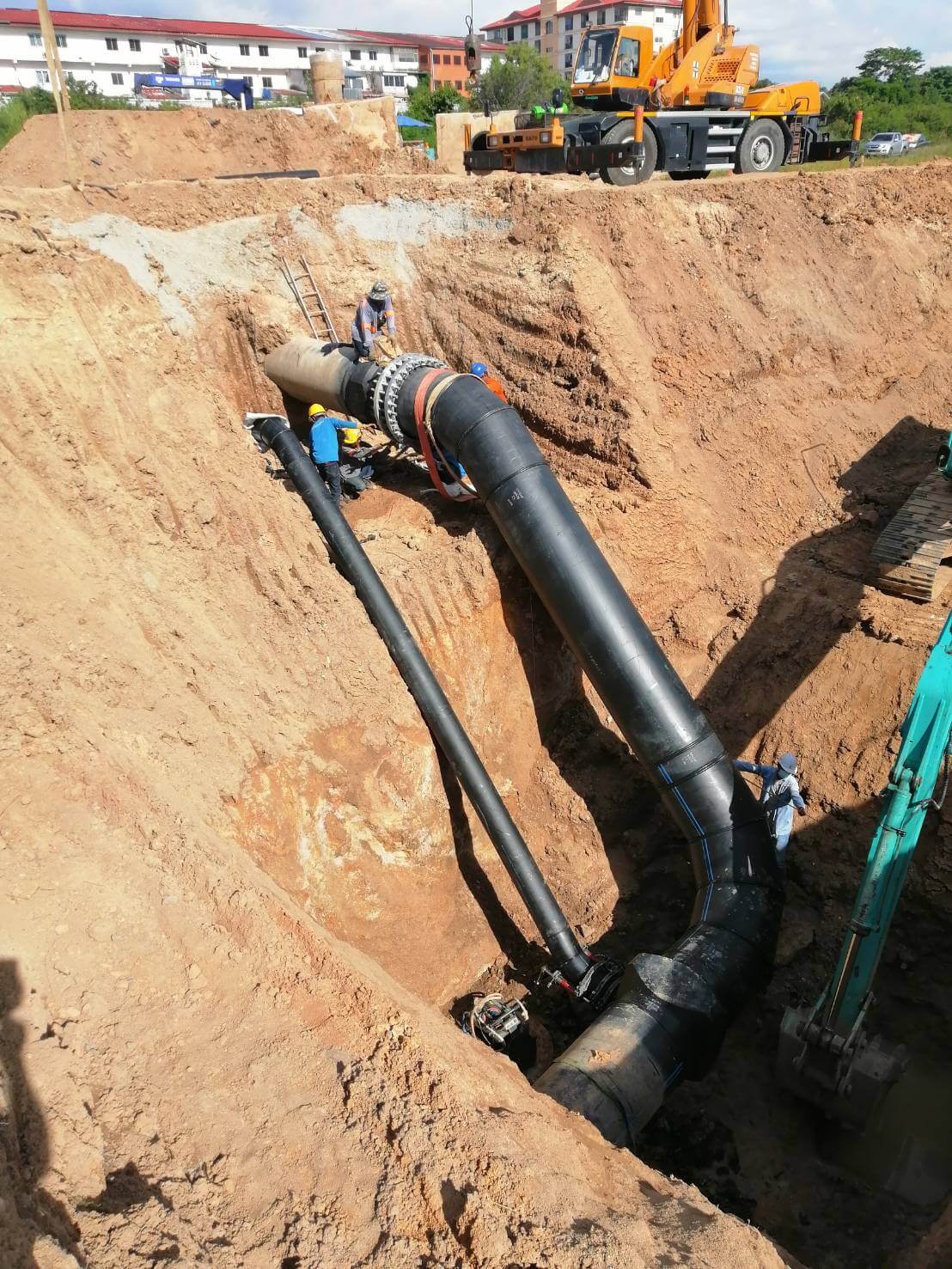 Engineer skillfully welding a pipe fitting with a flange