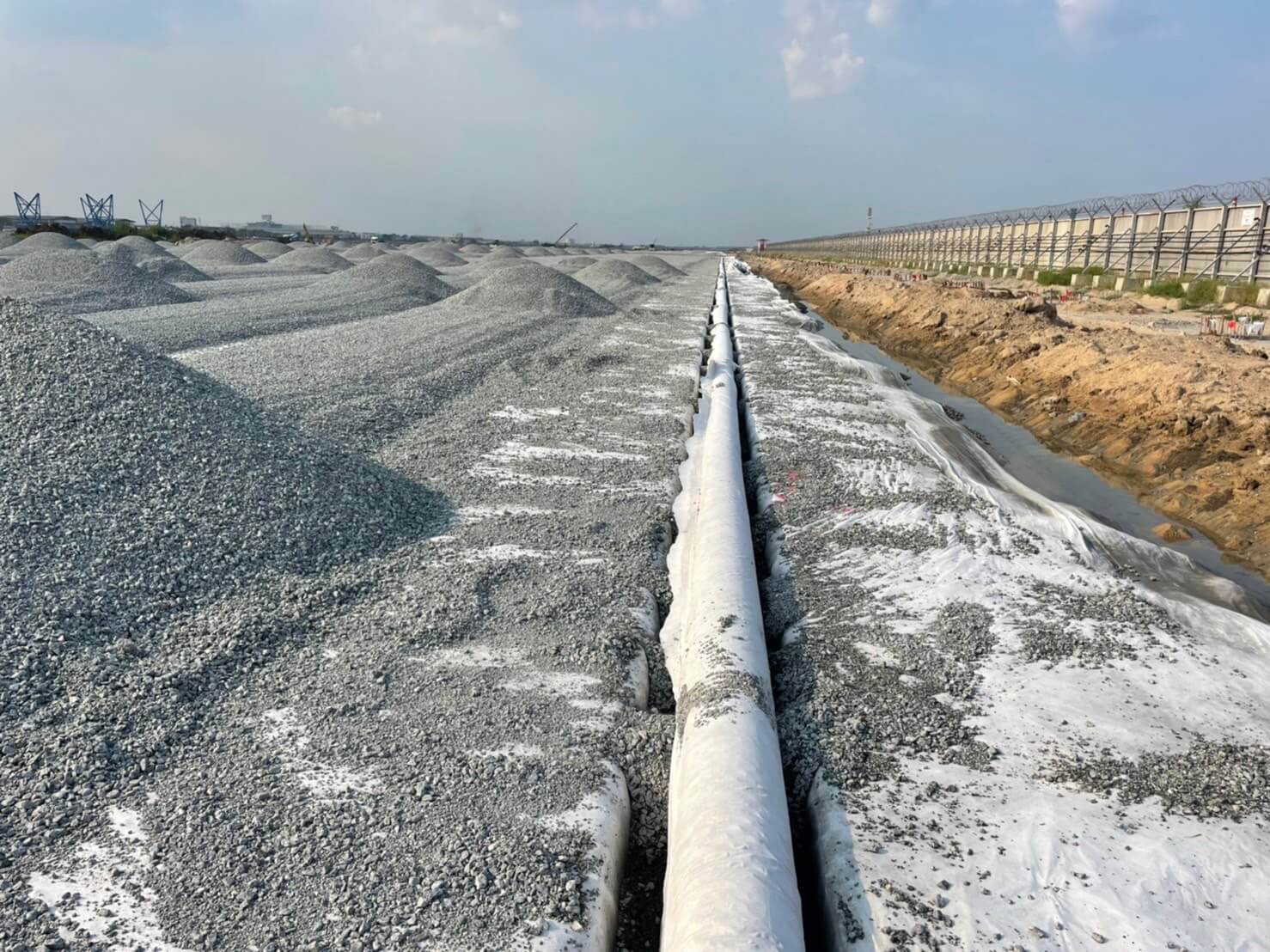 The trench installation process of corrugated pipes ( TAPKORR ) at Suvarnabhumi Airport