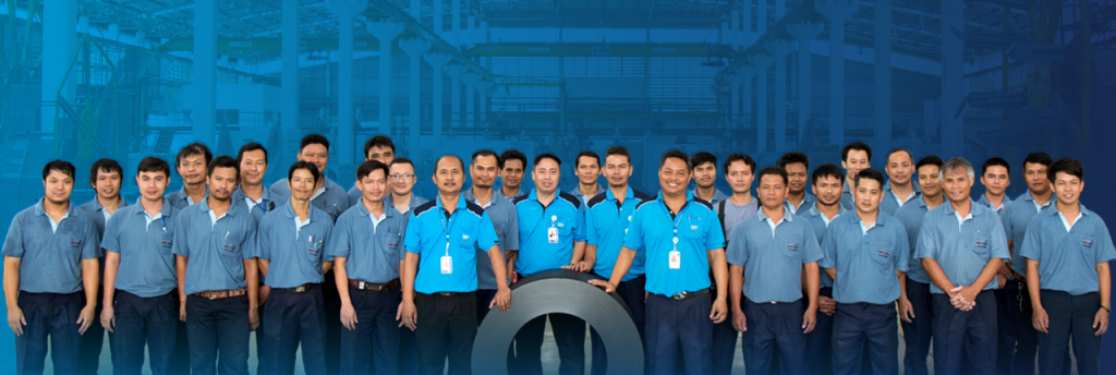 Employees of Thaiasia Company working together on HDPE pipes, demonstrating their expertise and teamwork