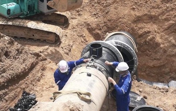 Engineer welding HDPE pipe after Pipe Jacking Installation