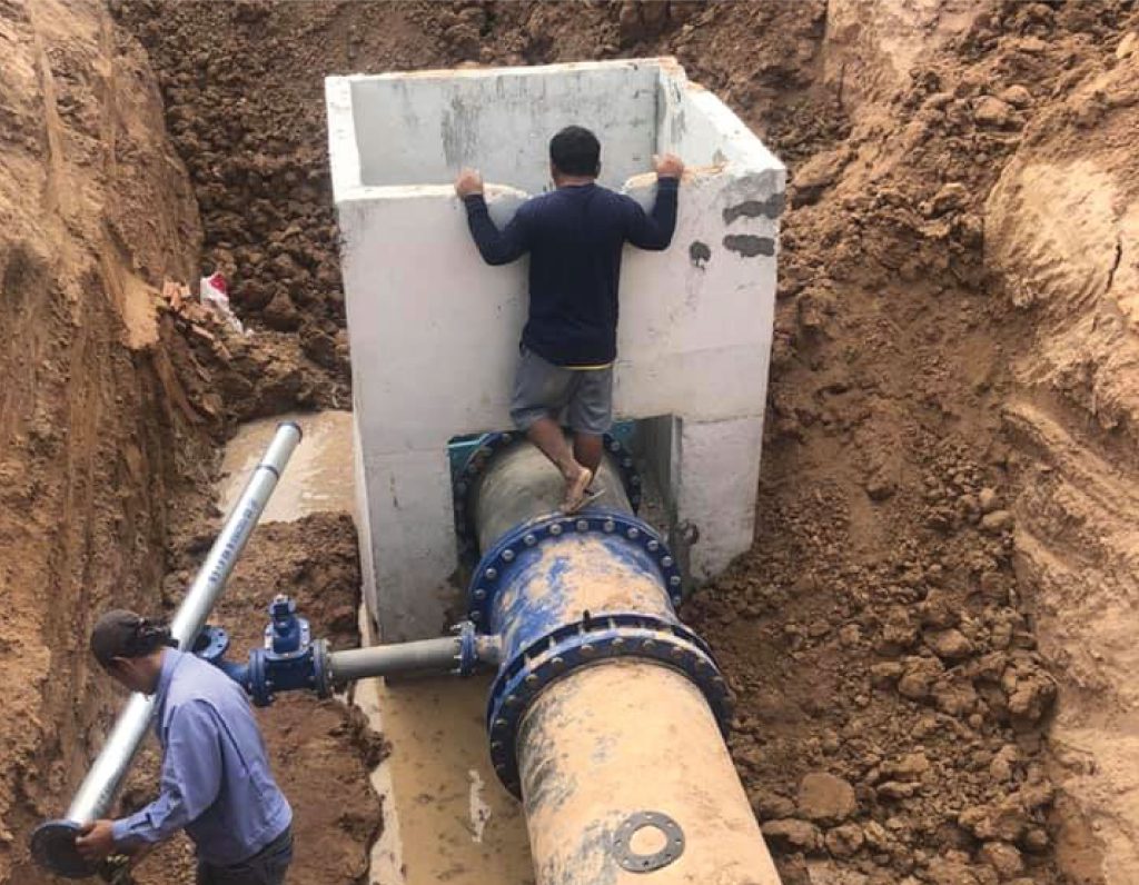 Engineers building a concrete manhole in a drought relief project in Buriram province