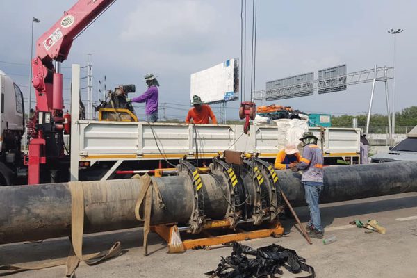 Engineers welding HDPE pipes using butt-fusion method to help drought in Bang Pakong